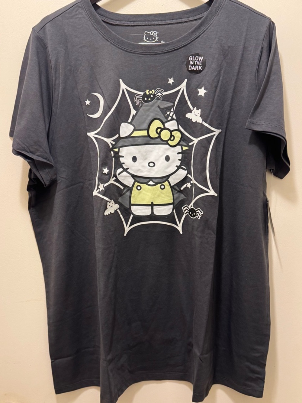 Hello Kitty Black Tee with White Logo and Yellow Trim